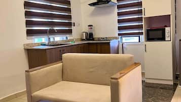Deluxe Apartment, Balcony, City View | Living area