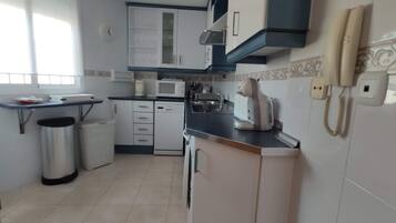 Réfrigérateur, four, plaque de cuisson, lave-vaisselle