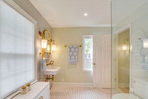 Shower, towels, soap, toilet paper