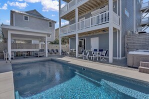 A heated pool - Unique Beach Retreat: Pool, Hot Tub, Rooftop Deck, Views & Elevator (Surf City)