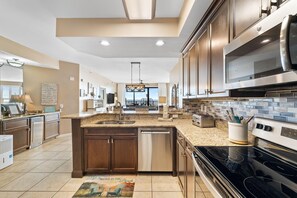 Condo, Multiple Beds (Seachase 103E) | Private kitchen | Oven, toaster, paper towels