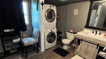 Hair dryer, towels, soap, toilet paper