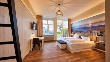 Quadruple Room, Roll-in Shower, Patio | Bathroom | Shower, hair dryer, towels, soap