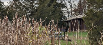 Two bedroom family cabin by private fishing lake.
