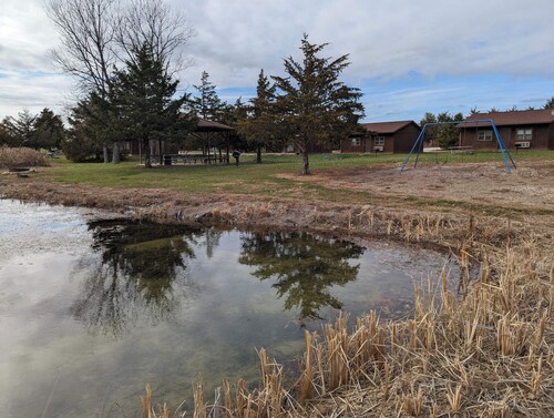 Two bedroom family cabin by private fishing lake.