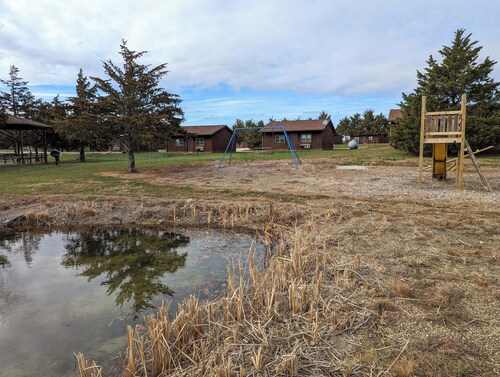 Deluxe two queen bed motel room packed with amenities.