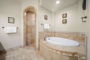 Shower, hair dryer, towels, shampoo - Western Front - Rustic Charm & Comfort (Hurricane)