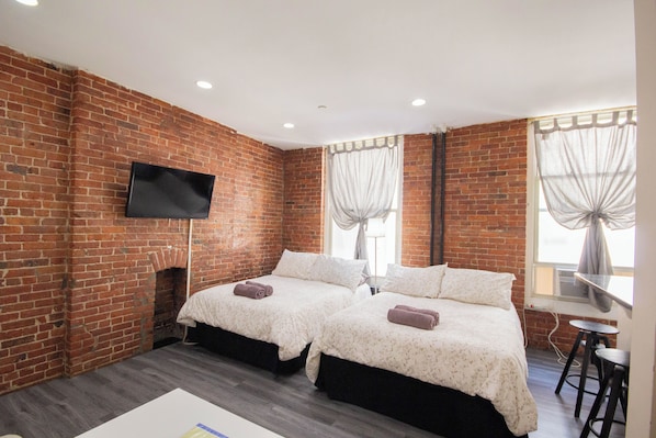 1 slaapkamer, een strijkplank/strijkijzer, wifi, beddengoed