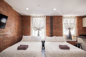 1 slaapkamer, een strijkplank/strijkijzer, wifi, beddengoed