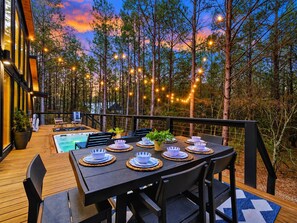 Dine al fresco in between soaks in the swim spa :-) - Swim & Recharge | Heated Pool Spa | Pool Table (Broken Bow)