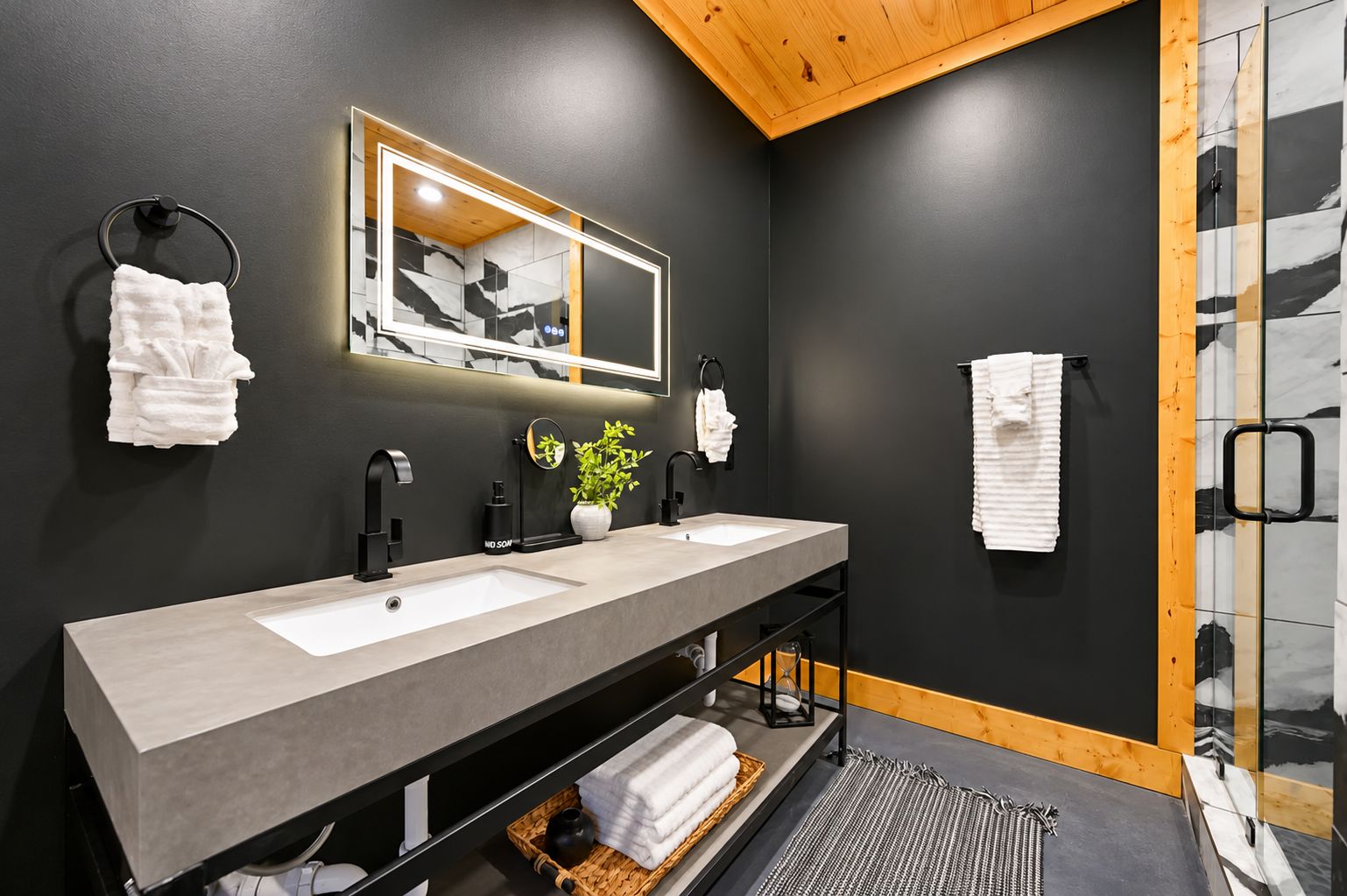 Modern elegance meets tranquility with dual sinks and sleek, stylish finishes.