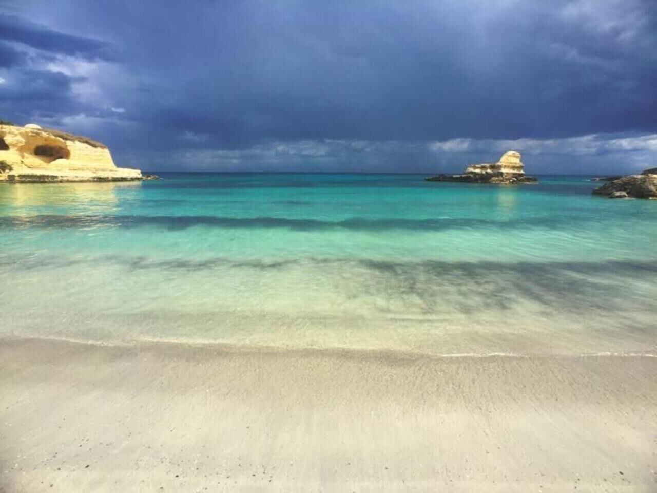 On the beach, sun-loungers