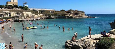 On the beach, sun loungers