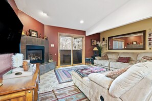 Smart TV, fireplace, books