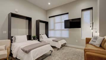 1 habitación, tabla de planchar con plancha, cuna de viaje y wifi