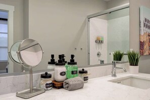 Shower, hair dryer, towels, shampoo - Downtown Luxury Loft | Extreme Walkability (Bozeman)