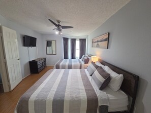 1 bedroom, desk, iron/ironing board, travel cot