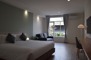 Chambre familiale | Système d’insonorisation, accès au Wi-Fi (inclus), literie fournie