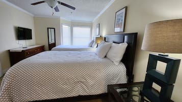 1 bedroom, desk, iron/ironing board, travel crib
