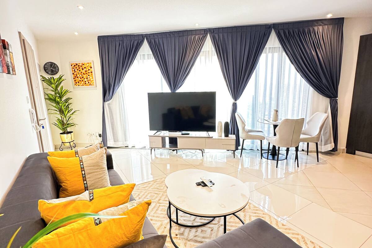 Superior Apartment, 1 Bedroom, City View | Living area | 55-inch Smart TV with digital channels