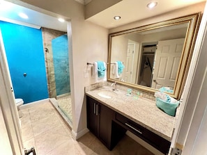 Shower, hair dryer, towels, soap