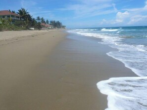 On the beach, sun loungers, beach towels