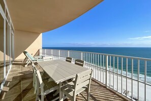 Outdoor dining - Luxury 4BR Beachfront Corner Unit, Panoramic Gulf Views, Lazy River, Indoor Pool (Orange Beach)