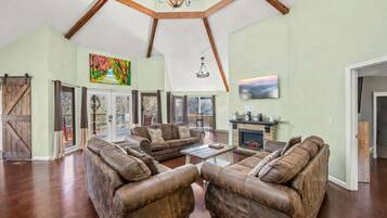 Smart TV, fireplace, books