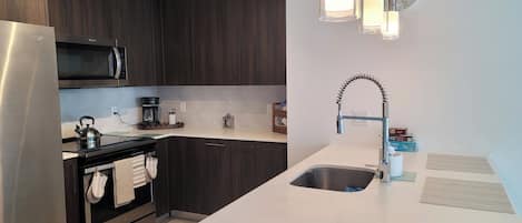 Fridge, microwave, oven, stovetop