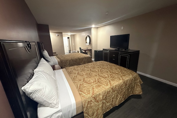 Suite, Multiple Beds, Non Smoking | Premium bedding, pillowtop beds, desk, laptop workspace