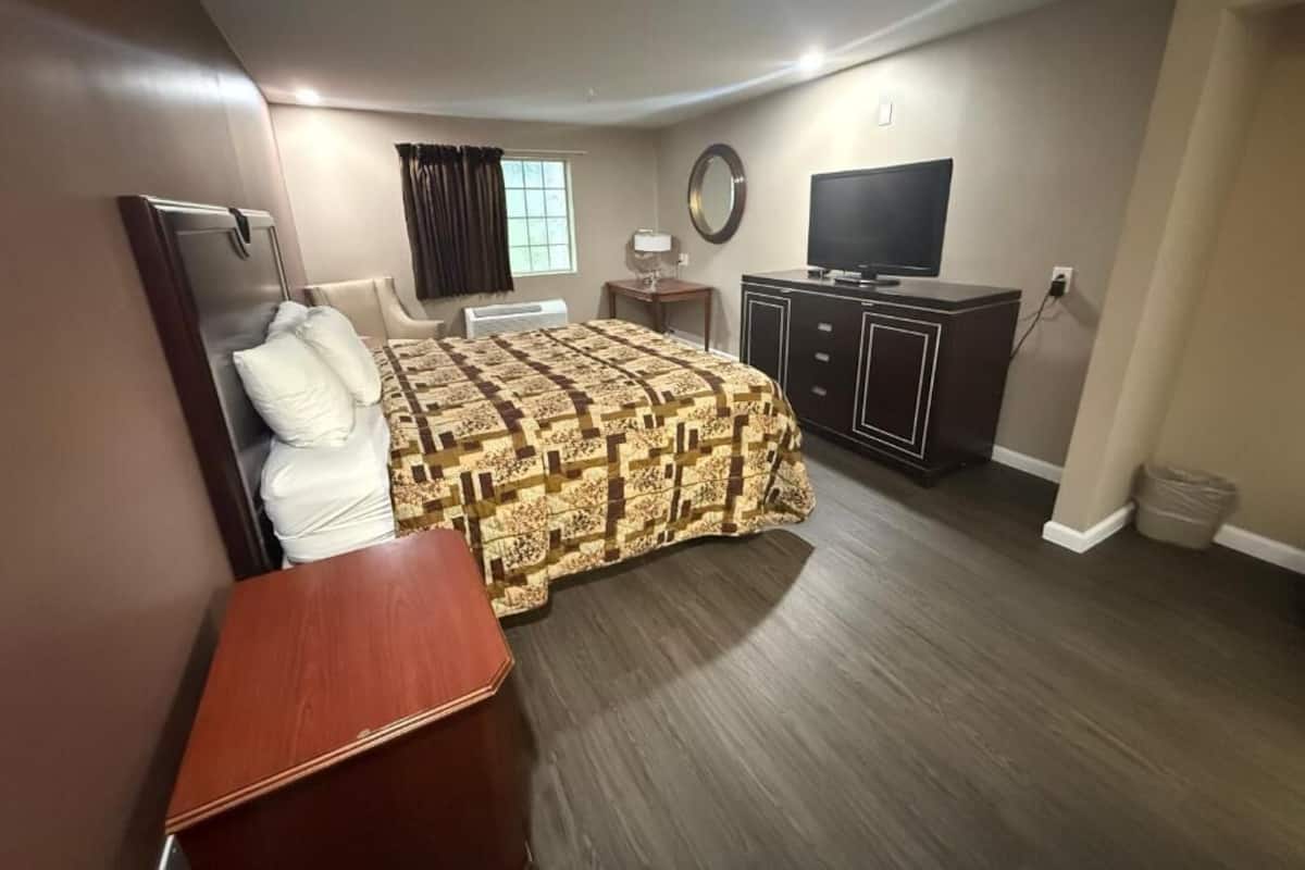 Premium bedding, pillow-top beds, desk, laptop workspace