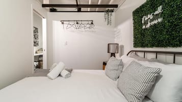 1 bedroom, desk, iron/ironing board, travel crib