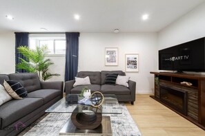 Smart TV, fireplace, books, offices