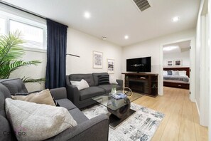 Smart TV, fireplace, books, offices