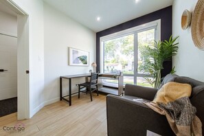 Smart TV, fireplace, books, offices