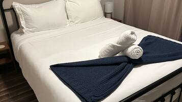 2 quartos, berço de viagem, Wi-Fi, roupa de cama