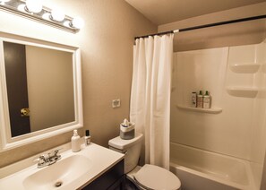 Hair dryer, towels, soap, shampoo