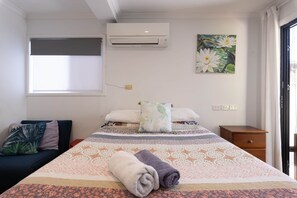 1 habitación, tabla de planchar con plancha, wifi y ropa de cama 
