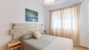 3 dormitorios, tabla de planchar con plancha, wifi gratis y ropa de cama