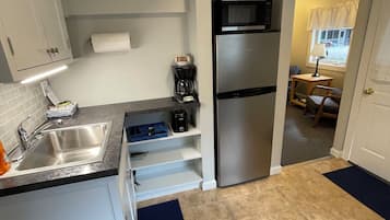 Cottage | Private kitchen | Full-size fridge, microwave, stovetop, toaster