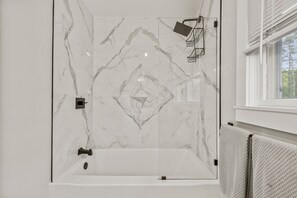 Shower, hair dryer, towels, soap