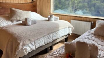 Habitación triple superior, vista al río