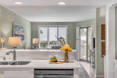 New Listing! Tidewater Ocean View! Steps from the Beach! Screened in Porch! 