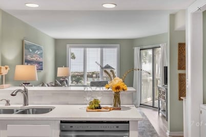 New Listing! Tidewater Ocean View! Steps from the Beach! Screened in Porch! 