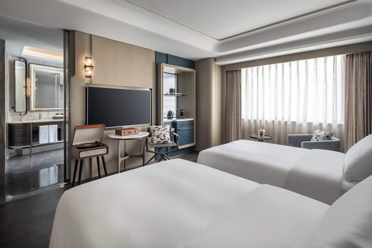 Luxe beddengoed, donsdekens, een minibar, een kluis op de kamer
