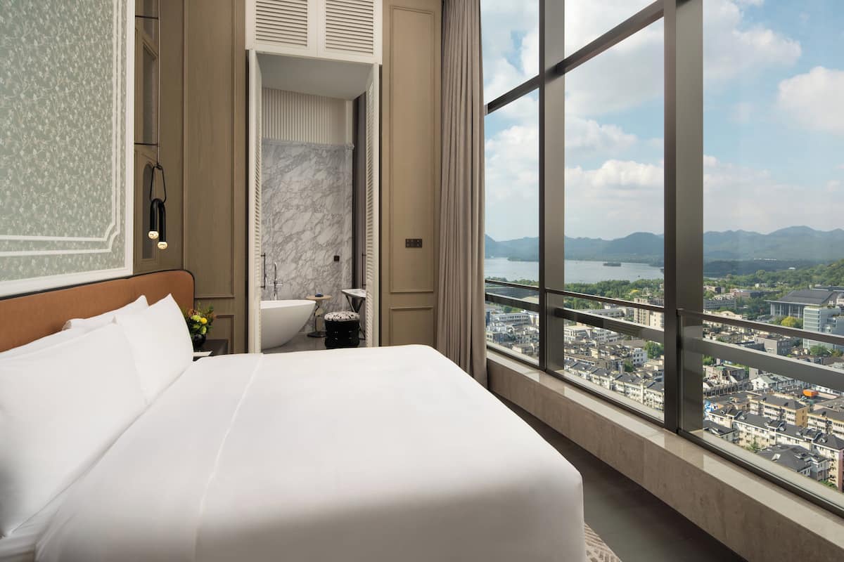 Sviitti, 1 yhden hengen sänky (Wulin) | Ylelliset vuodevaatteet, untuvapeitot, minibaari, tallelokero huoneessa