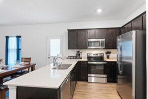 Fridge, microwave, oven, stovetop - Spacious 3BR Home with Large Backyard – Perfect for Families! (Bastrop)