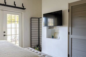Iron/ironing board, travel crib, free WiFi, bed sheets