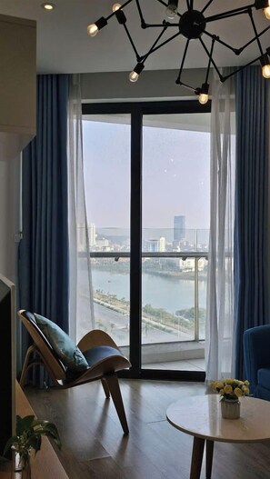 Apartment, 3 Bedrooms | Living area | 80-inch flat-screen TV with digital channels, TV - Angela House Ha Long (Ha Long)