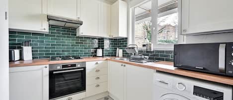 Fridge, microwave, oven, coffee/tea maker